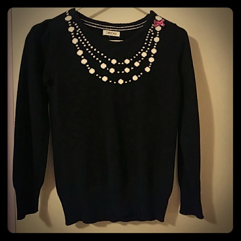 Girly girl black sweater with pretty detail!
